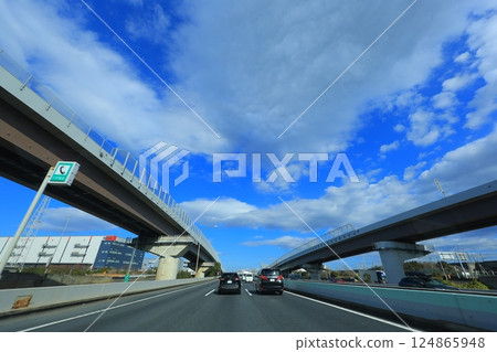 Car running on highway 124865948