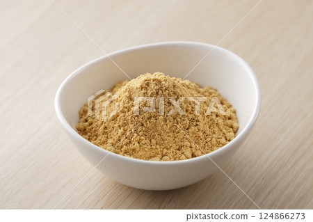 Kinako (roasted soybean flour) served on a white plate Kinako (roasted soybean flour) served on a white plate 124866273