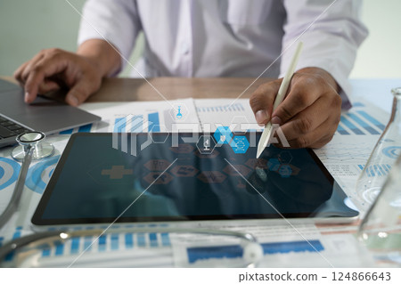 Medical Analysis doctor working with medical statistics digital health monitoring interface 124866643