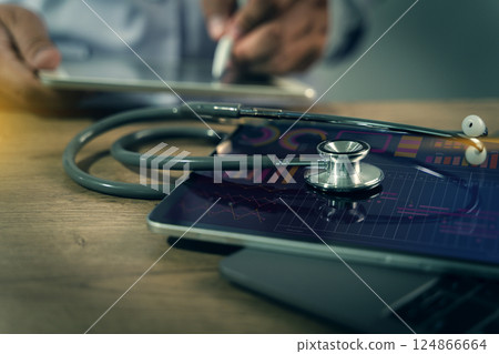 stethoscope analysis on a digital health chart  124866664