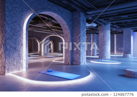 Modern yoga studio with glowing floors and abstract lights, a hub of fitness innovation 124867776