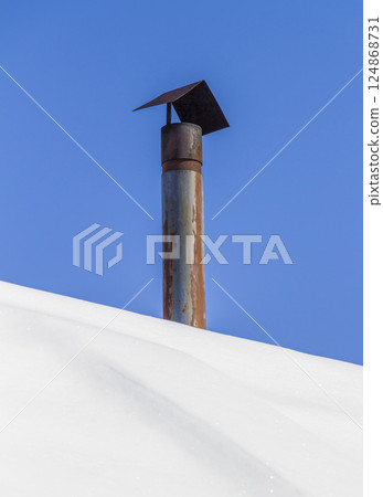 Chimney on the roof Chimney on the roof 124868731