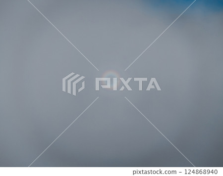 Aerial view of beautiful aura light on foggy high altitude grassland landscape Aerial view of beautiful aura light on foggy high altitude grassland landscape 124868940