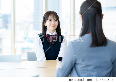 Female student consulting Female student consulting 124870308