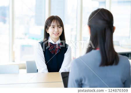 Female student consulting Female student consulting 124870309