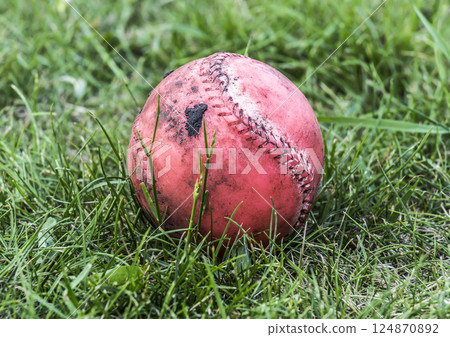 Dirty red ball 124870892