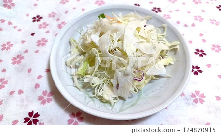 Shredded cabbage core (hard part with veins) 124870915