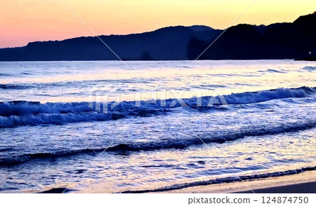 The beach at sunset The beach at sunset 124874750