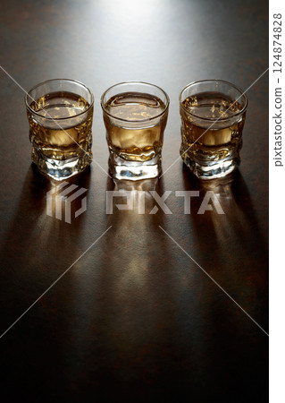 Small glasses of strong alcoholic drink. 124874828