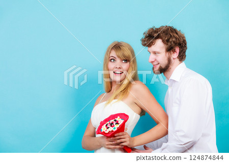 Couple with candy bunch flowers. Love. 124874844