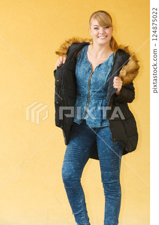 Fashion girl in jacket. 124875022