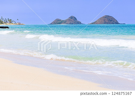 Hawaiian Holidays: Mokulua Islands as seen from Bellows Beach on Oahu Hawaiian Holidays: Mokulua Islands as seen from Bellows Beach on Oahu 124875167