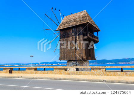 Old wooden windmill in the old town of Nessebar, Bulgaria 124875664