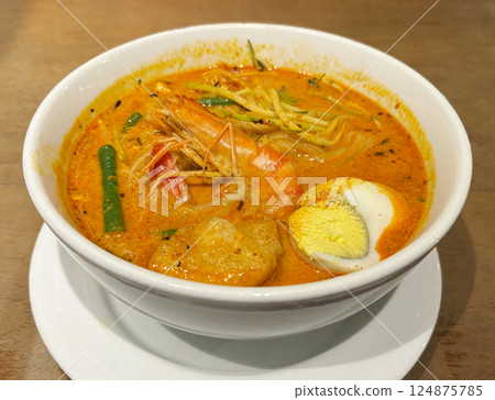 Laksa (Malaysian cuisine) coconut soup 124875785