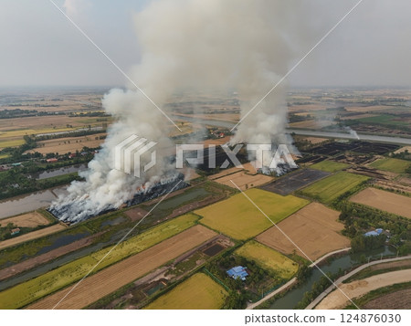 field, fire, smoke 124876030