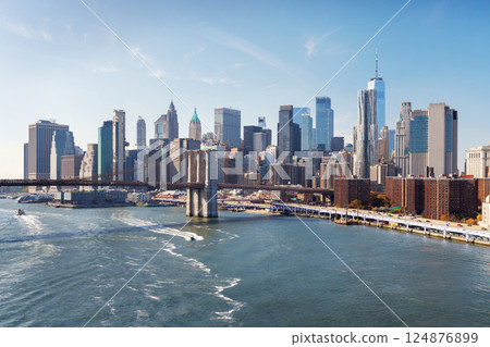 A panoramic view of the Brooklyn Bridge stretching towards Manhattan 124876899