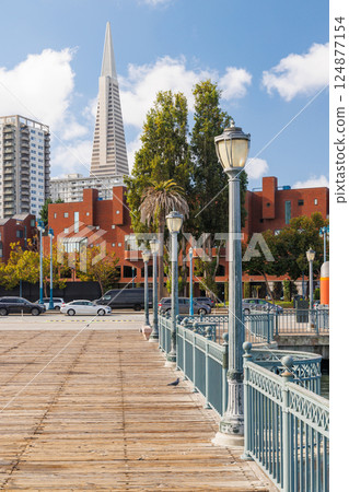Scenic view of a classic wooden pier stretching into the San Francisco Bay Scenic view of a classic wooden pier stretching into the San Francisco Bay 124877154