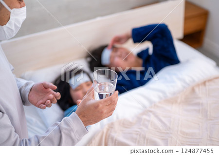 Parents and children being cared for 124877455