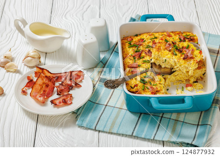 fresh corn pudding casserole in a baking dish fresh corn pudding casserole in a baking dish 124877932