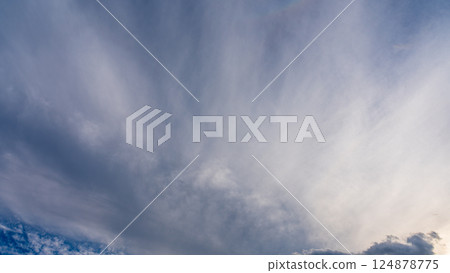 Thin clouds in the blue sky at dusk 124878775