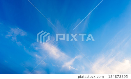 Thin clouds in the blue sky at dusk 124878895