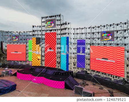 led screen installation and calibration for event stage setup, panel setup and testing for concert stage construction 124879521