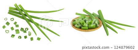 Green onion in wooden bowl isolated on the white background. Top view. Flat lay. Green onion in wooden bowl isolated on the white background. Top view. Flat lay. 124879602