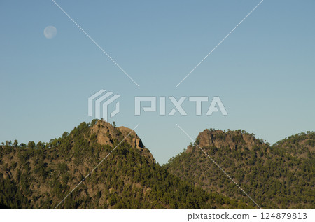 Cliffs and full moon. Cliffs and full moon. 124879813