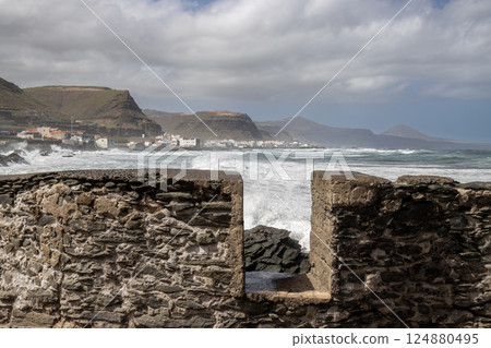 Stone fence and Atlantic ocean, Spain 124880495