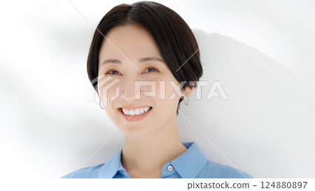 A smiling woman A smiling woman 124880897
