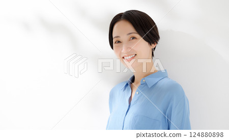 A smiling woman A smiling woman 124880898