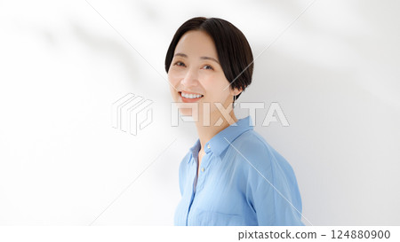 A smiling woman A smiling woman 124880900
