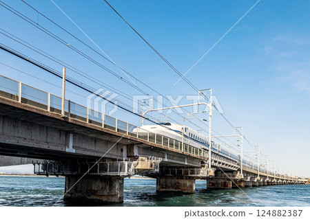 The Tokaido Shinkansen running over Lake Hamana 124882387