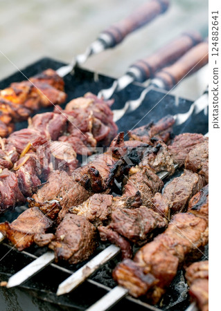 Grilled Meat Skewers on Barbecue 124882641