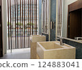 Wash stone basins at the hotel spa resort outside by swimming pool  124883041