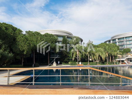 Swimming pool in hotel and resort without people for background Swimming pool in hotel and resort without people for background 124883044