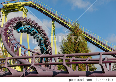 Amusement roller coaster for fun in the park 124885103