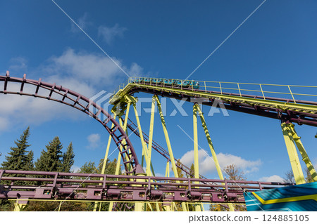 Amusement roller coaster for fun in the park 124885105
