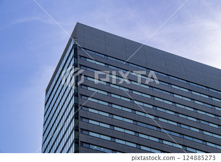 Blue sky and office building 124885273