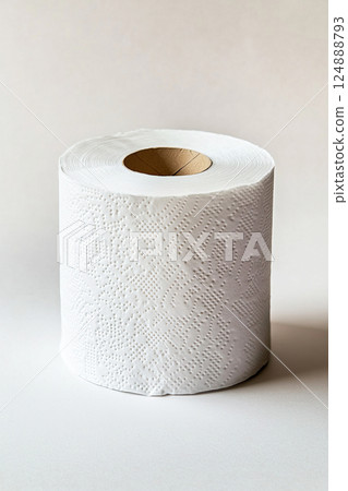 Toilet paper roll on white background promoting hygiene and cleanliness Toilet paper roll on white background promoting hygiene and cleanliness 124888793