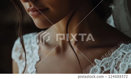 Woman with a white dress and a lace collar. She has a white lace collar on her dress 124889372
