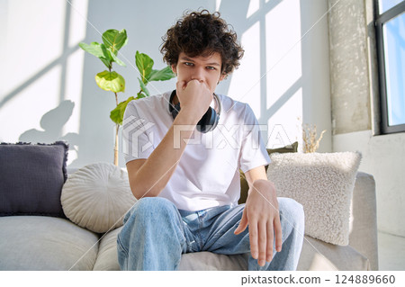 Young guy university student talking looking in web camera, at home 124889660