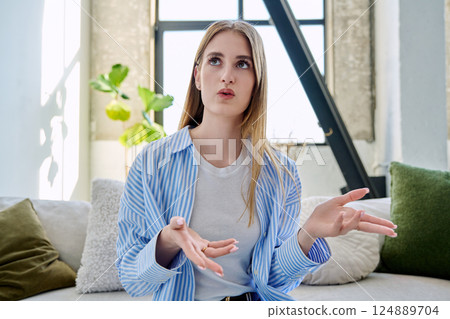 Web camera view of teenage girl talking looking in camera, online meeting, video call 124889704