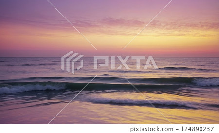 Ocean Sunset with Gentle Waves and Vibrant Purple Sky 124890237
