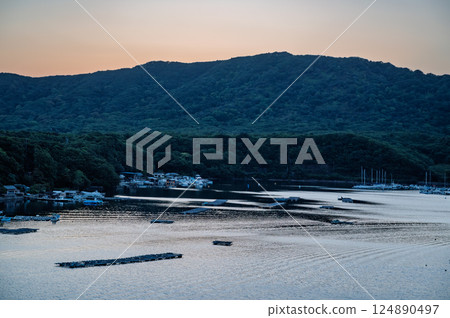 Calm sea in the evening Calm sea in the evening 124890497