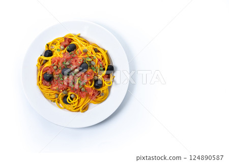 Italian Pasta puttanesca with tomato sauce, capers, and black olives isolated on white background Italian Pasta puttanesca with tomato sauce, capers, and black olives isolated on white background 124890587