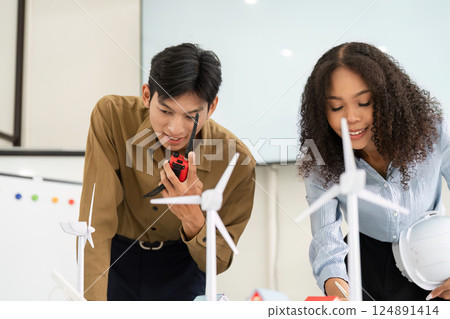 Innovation and Teamwork. Engaging in renewable energy project discussions using advanced tools. 124891414