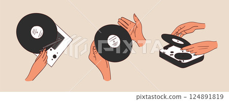 Hands holding a vinyl record. Portable turntable with vinyl playing. Old gramophone with analog grooved LP disc. Hands holding a vinyl record. Portable turntable with vinyl playing. Old gramophone with analog grooved LP disc. 124891819