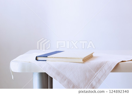 Closed book on table Closed book on table 124892340