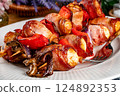 Tasty chicken skewers. 124892353